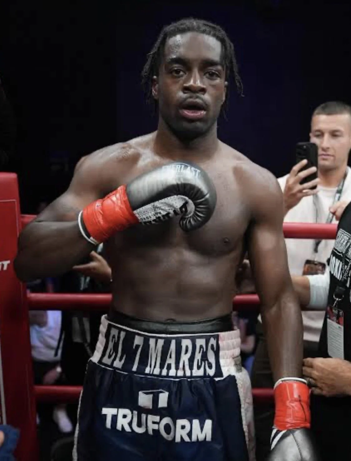 Samuel "S3" Arnold III celebrates in the ring after defending his WBA NABA Light Heavyweight Title in Long Beach, California.