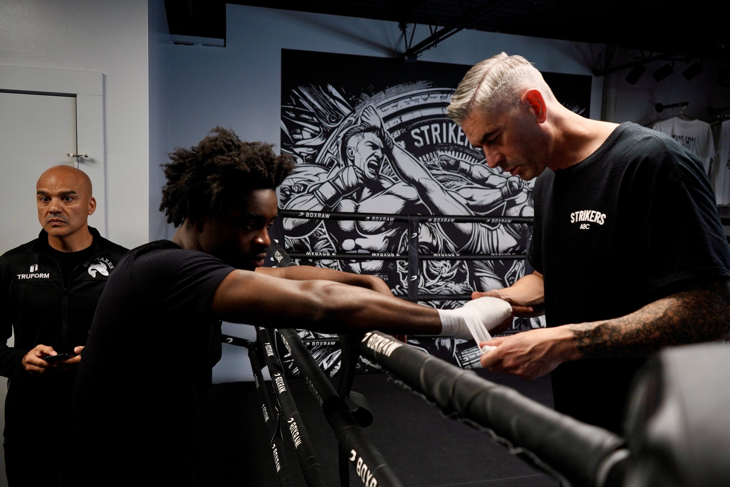 Samuel "S3" Arnold III works the mitts during his media workout at Strikers Gym in Dallas, Texas.