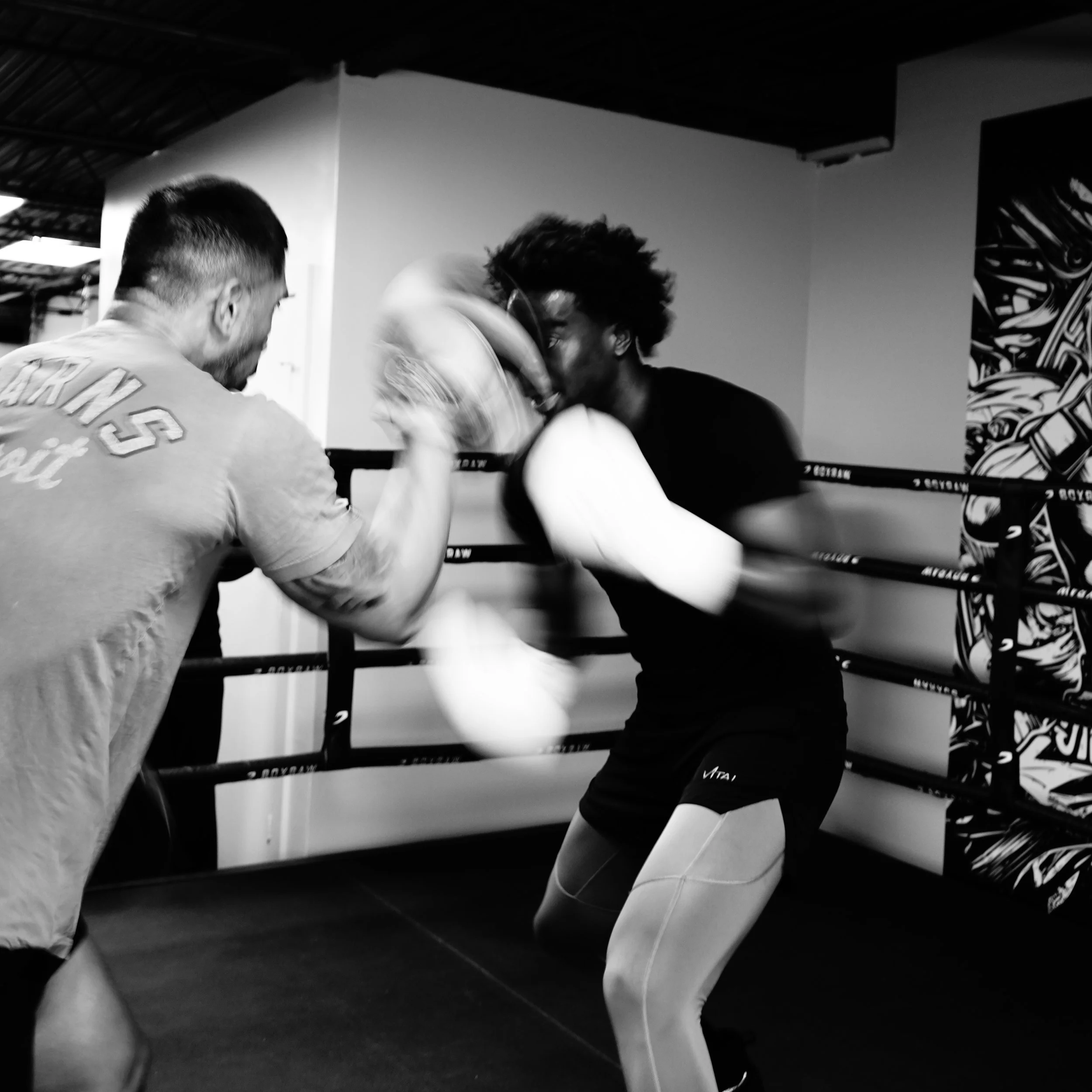 Samuel "S3" Arnold III and Coach John Pruna training with mits.