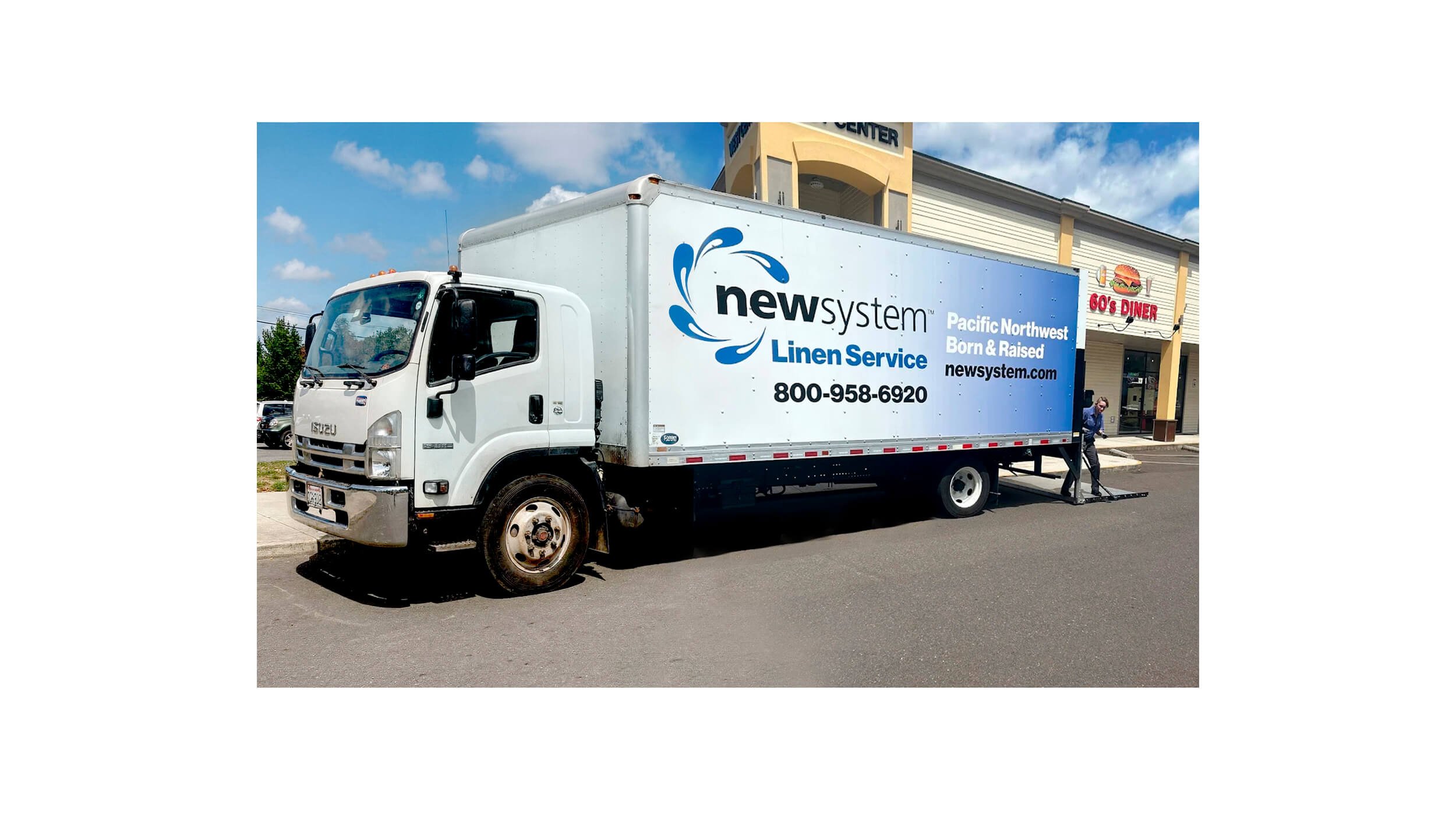 After: New System Linen Service truck signage wrap, redo.