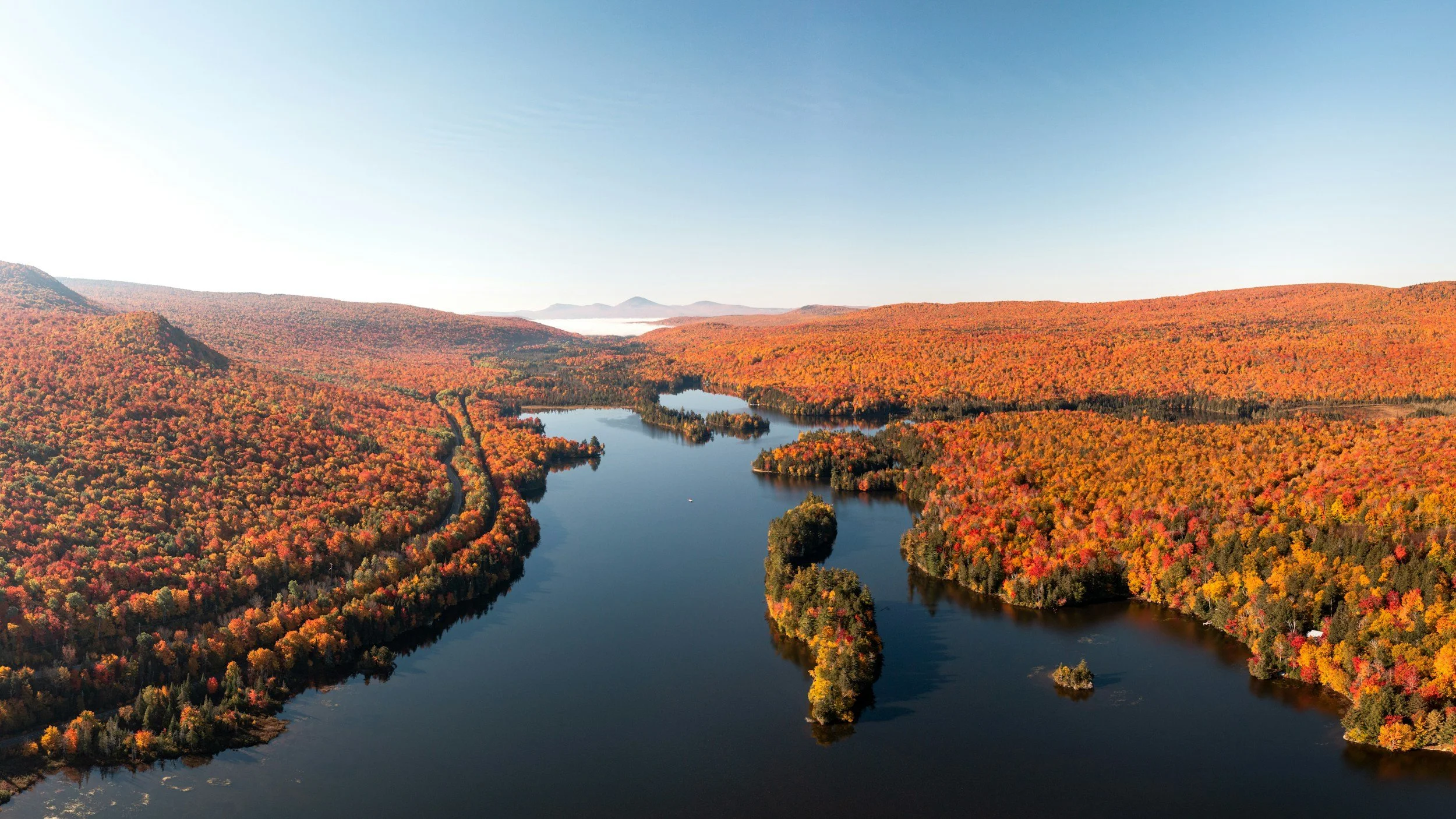 shot of a lake during foliage in new hampshire
