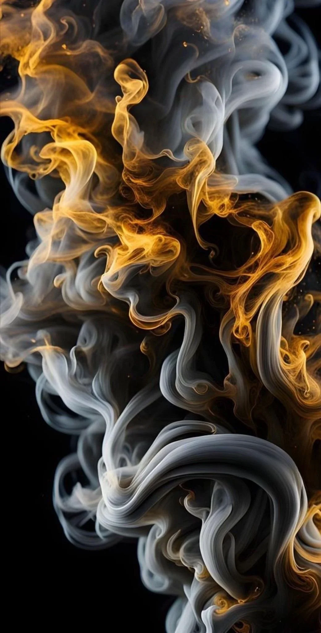 Swirling smoke in shades of white, gray, and gold against a black background.