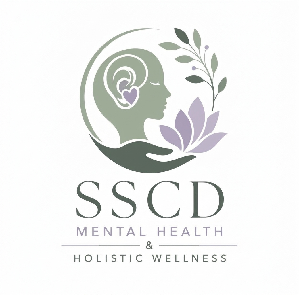 Logo for SSCD Mental Health & Holistic Wellness with a side profile of a woman's face, a stylized ear with a purple heart, surrounded by a lotus flower and leafy branches, in soft green and purple tones.