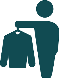 Silhouette of a person holding a garment.