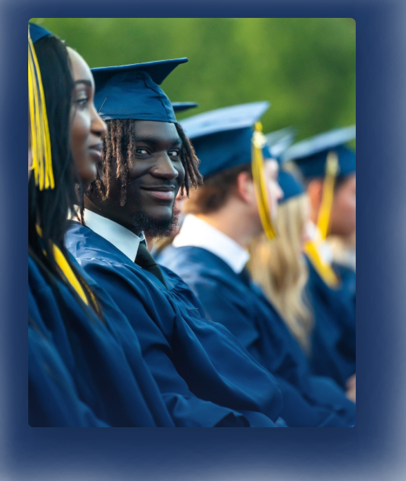 Graduates in caps and gowns at a graduation ceremony