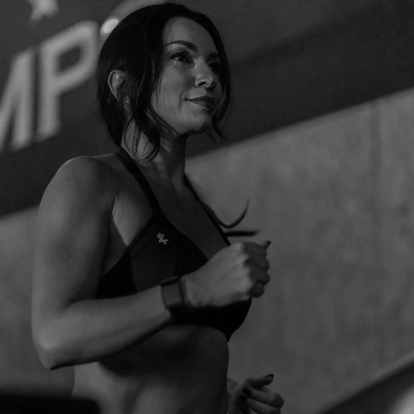 Woman training in a private gym while working toward strength, confidence, and lasting transformation.