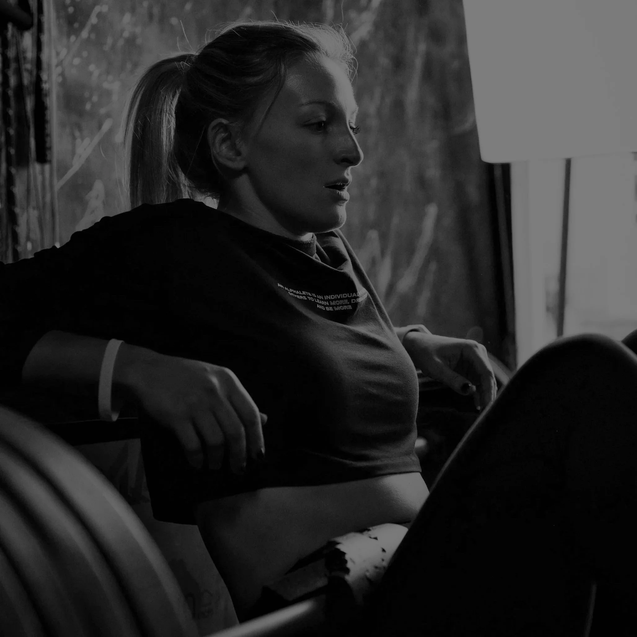 Woman improving confidence and overall fitness through personalized women's fitness and nutrition coaching.