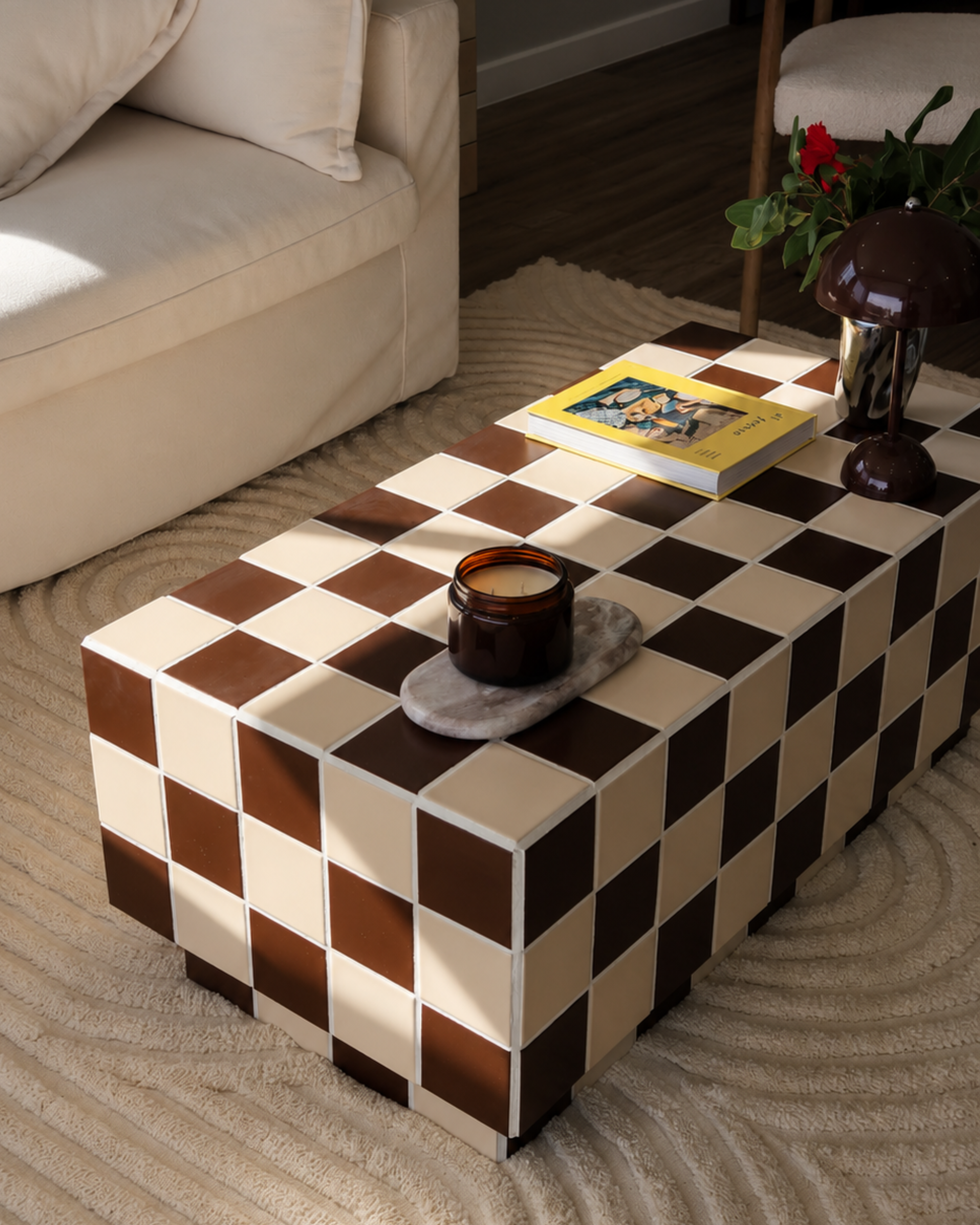 Custom tiled coffee table handcrafted on the Gold Coast by By Bloc, featuring a chocolate brown ceramic tile finish and modern living room styling.