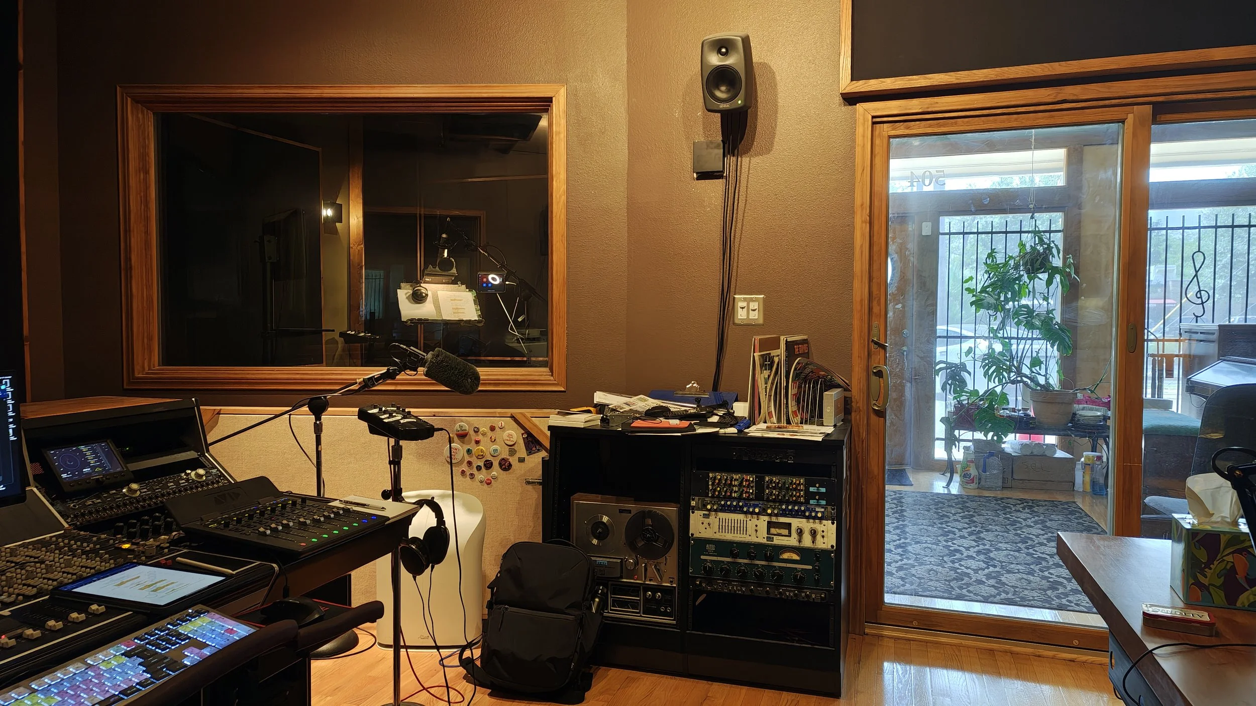 View towards the VO booth window and the front entry room/ coffee area.