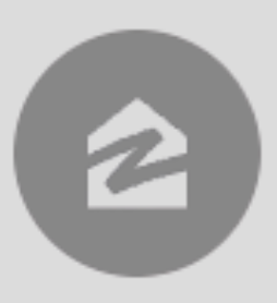 Gray circular icon with a white house and a Z symbol, indicating sleep mode or rest.