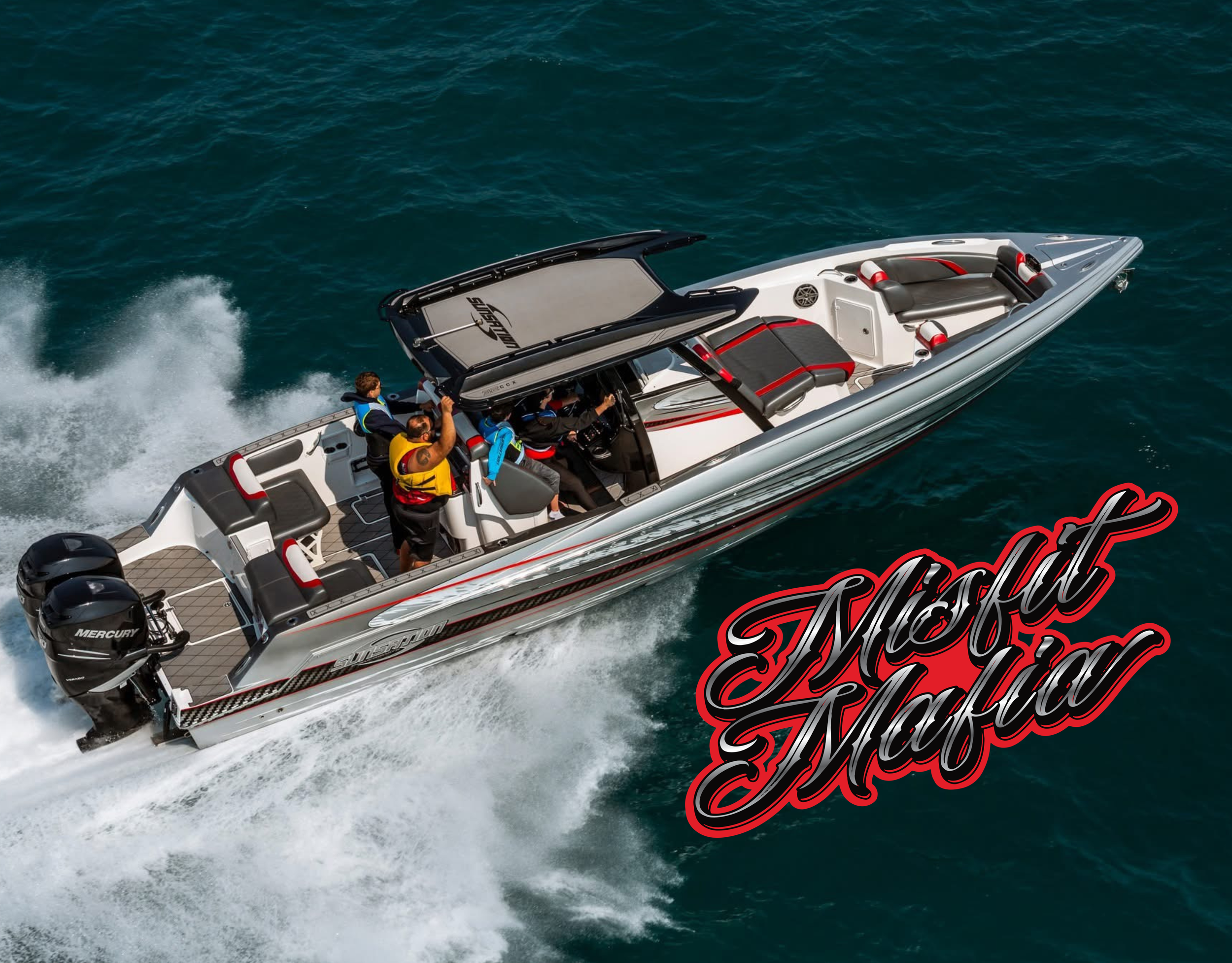 A speedboat with people aboard on the water, creating a wake behind it, with colorful upholstery and dual outboard engines.
