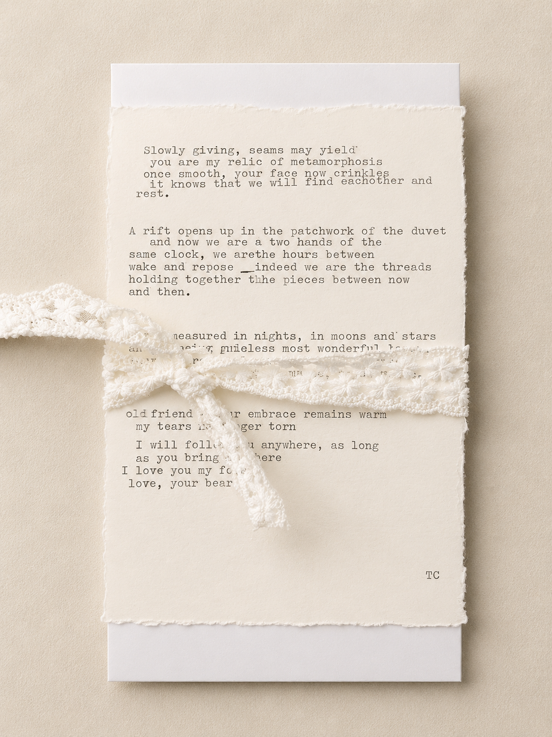 Signature Edition Poem featuring handmade deckled paper and premium lace ribbon