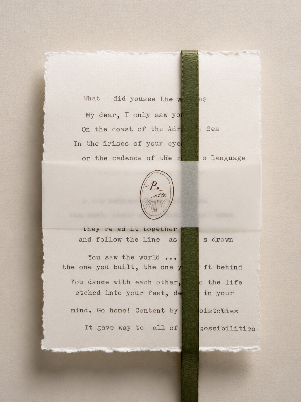 The Signature Edition poem featuring handmade deckled paper, sheer vellum belly band and ribboning.
