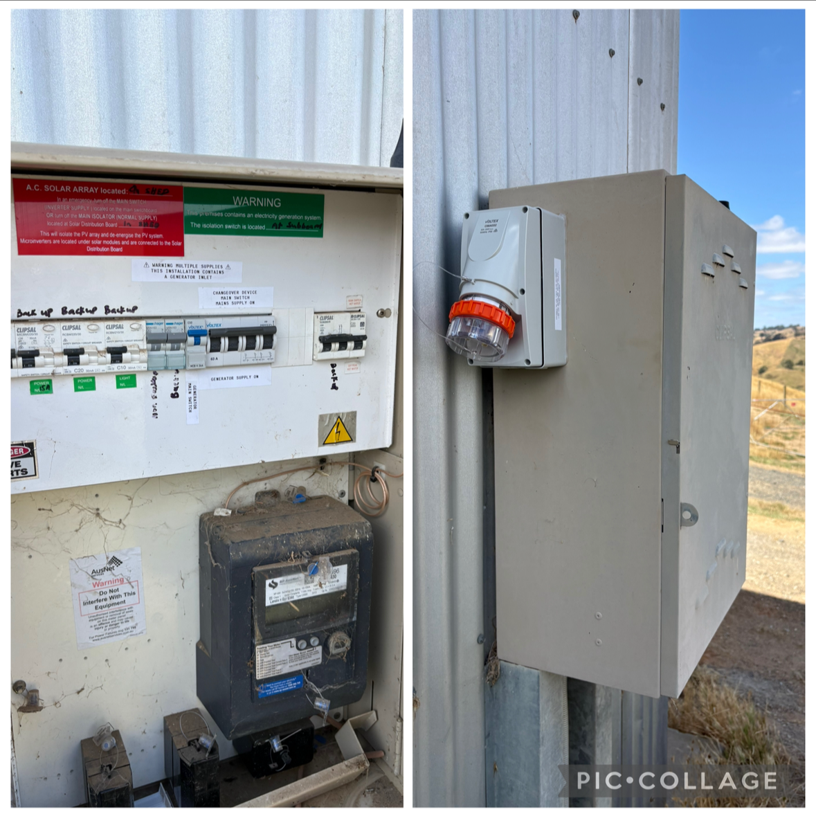 Electrical control panels and equipment outside, with one panel featuring circuit breakers, warning labels, and an electrical meter on the lower part, and another gray electrical box with a protected switch on a metal pole against a rural landscape w