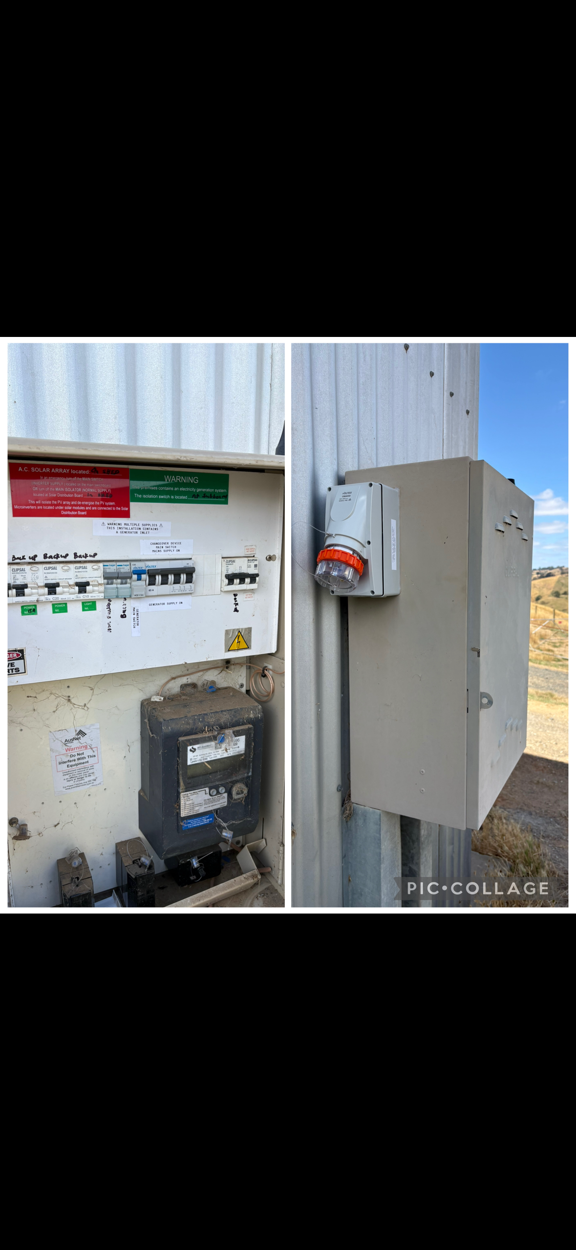 Close-up of an electrical panel and meter installed on a metal wall with a landscape background and blue sky.