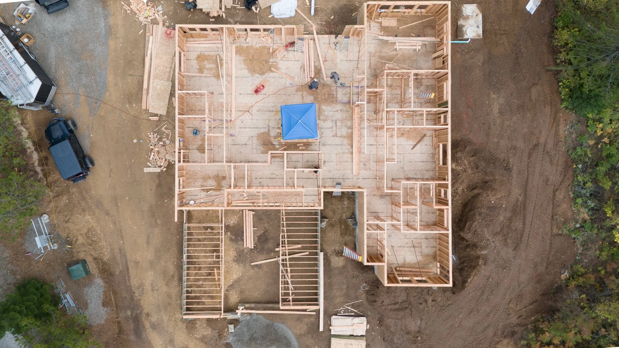 An aerial drone view of framing for a home building site near Sandpoint, Idaho.