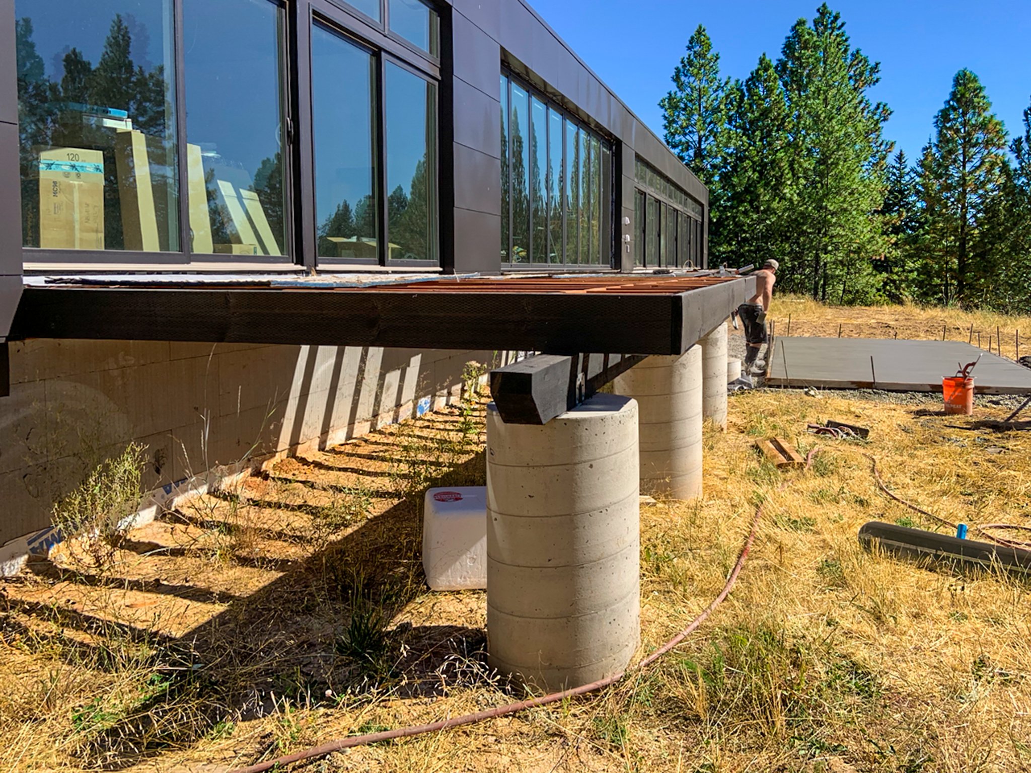 ICD-formed concrete foundation and pilings for a custom home in Coeur D'Alene, Idaho.