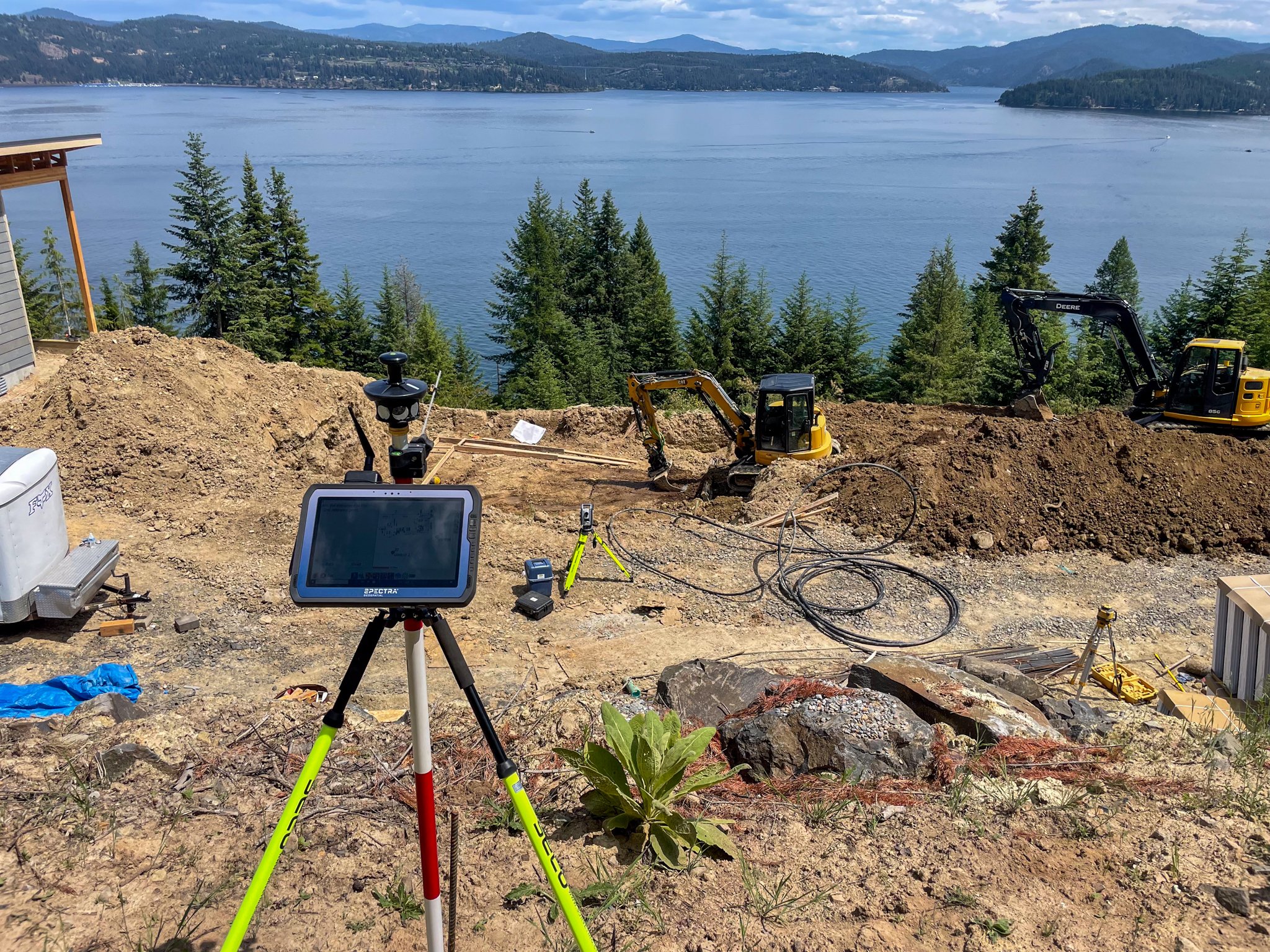 Using a grading laser to excavate a foundation for lakeside custom home in North Idaho.