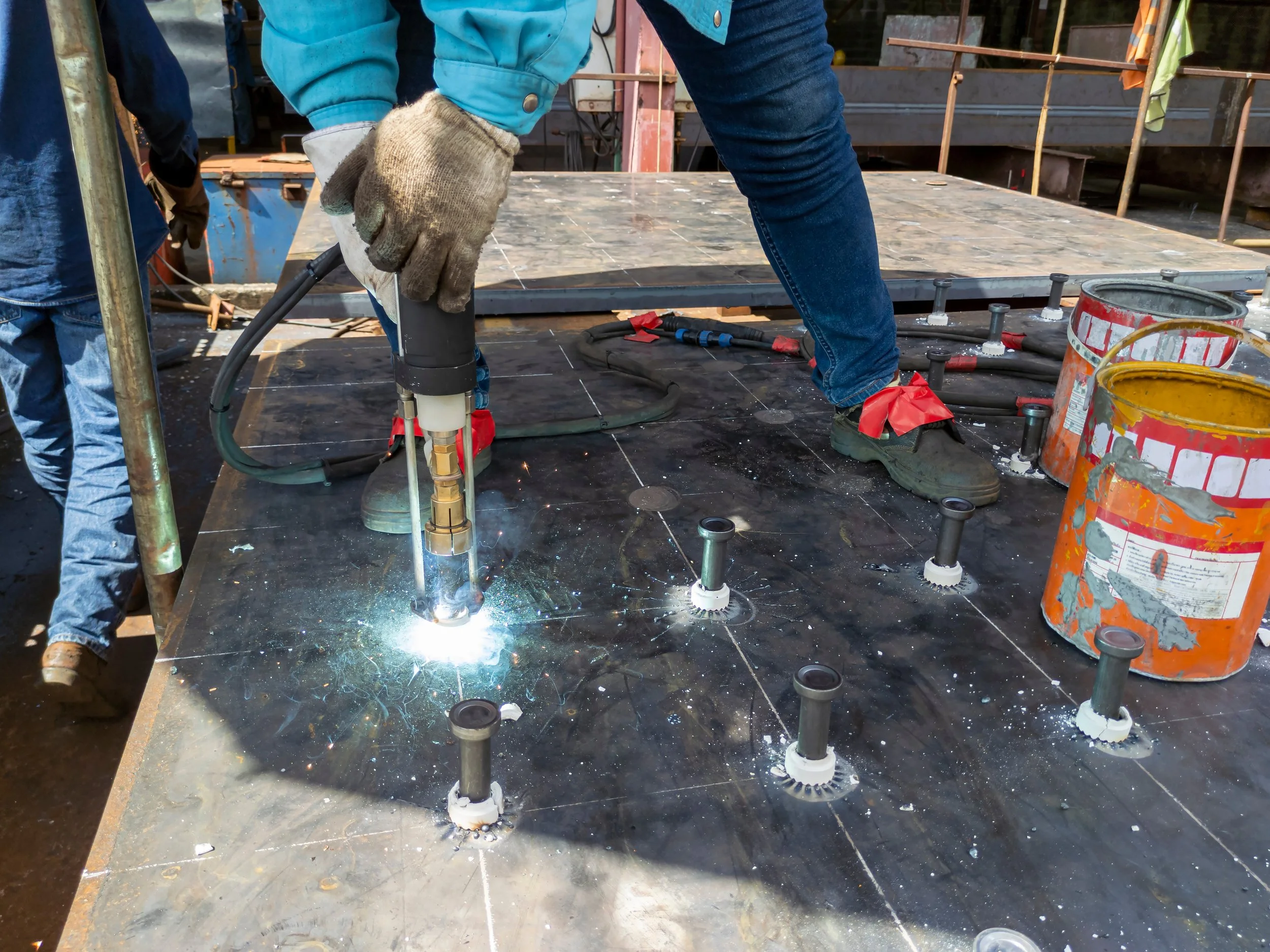Slab foundation forming with precision anchor embedment at a commercial building project.