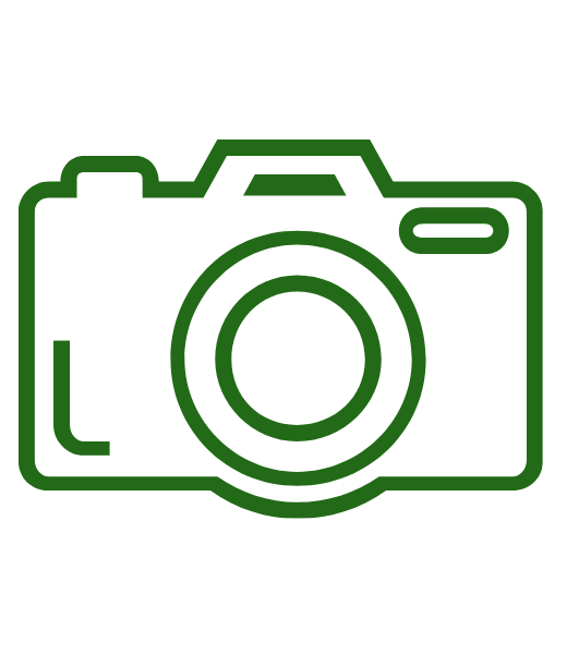 A clean, outlined icon of a DSLR camera, representing photography and wildlife observation.