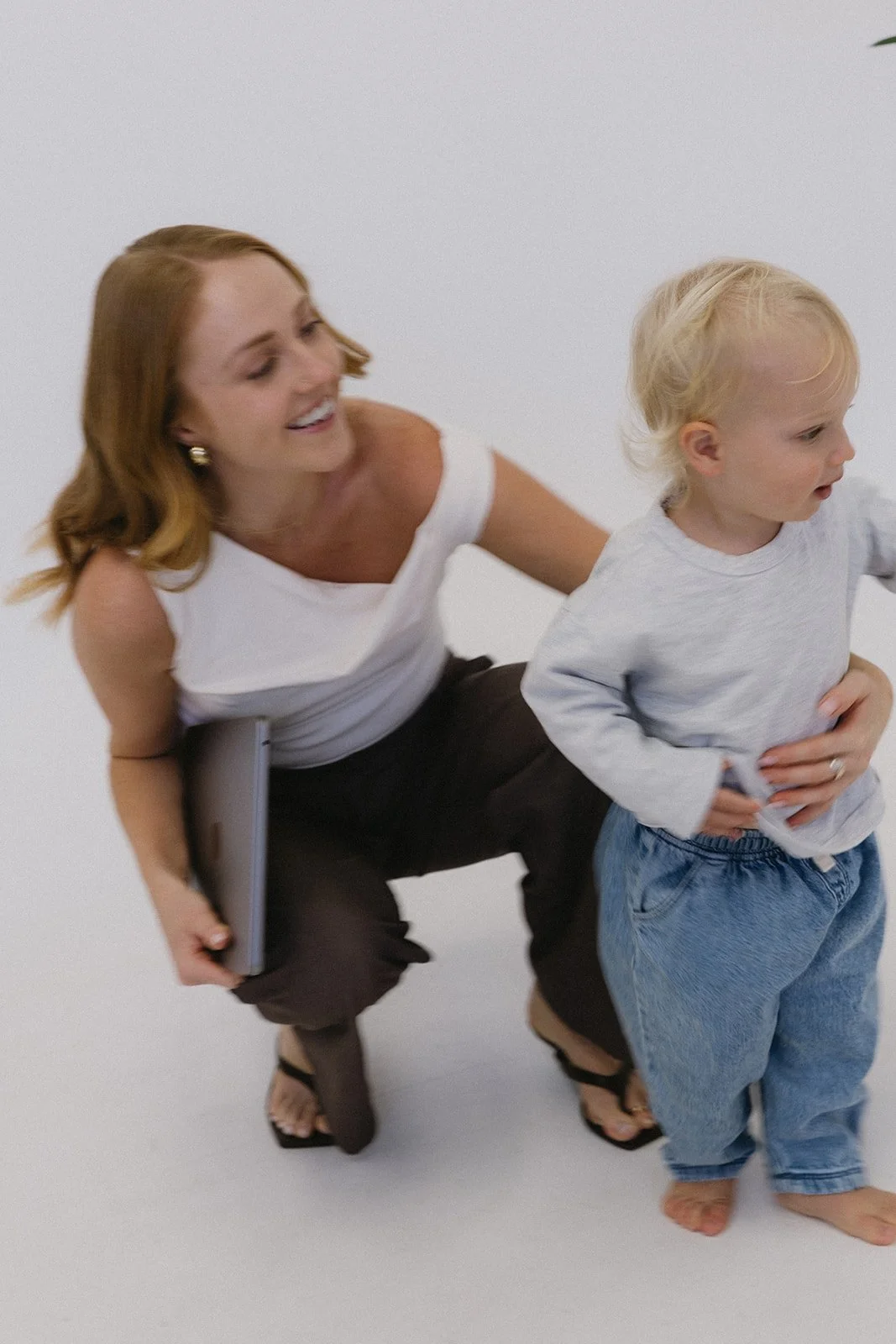 Women's health naturopath Allie Windsor with a young client during a children's naturopathy consultation