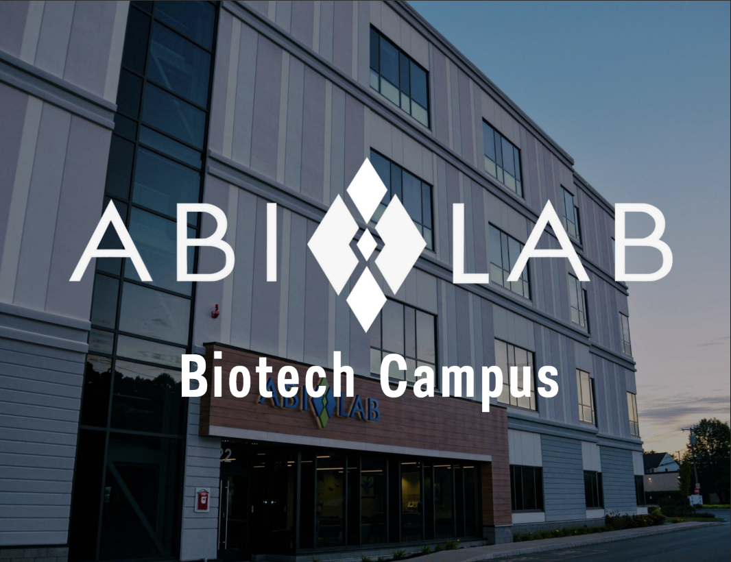 Exterior of a modern biotech campus building with the ABi LAB logo and sign reading "Biotech Campus".
