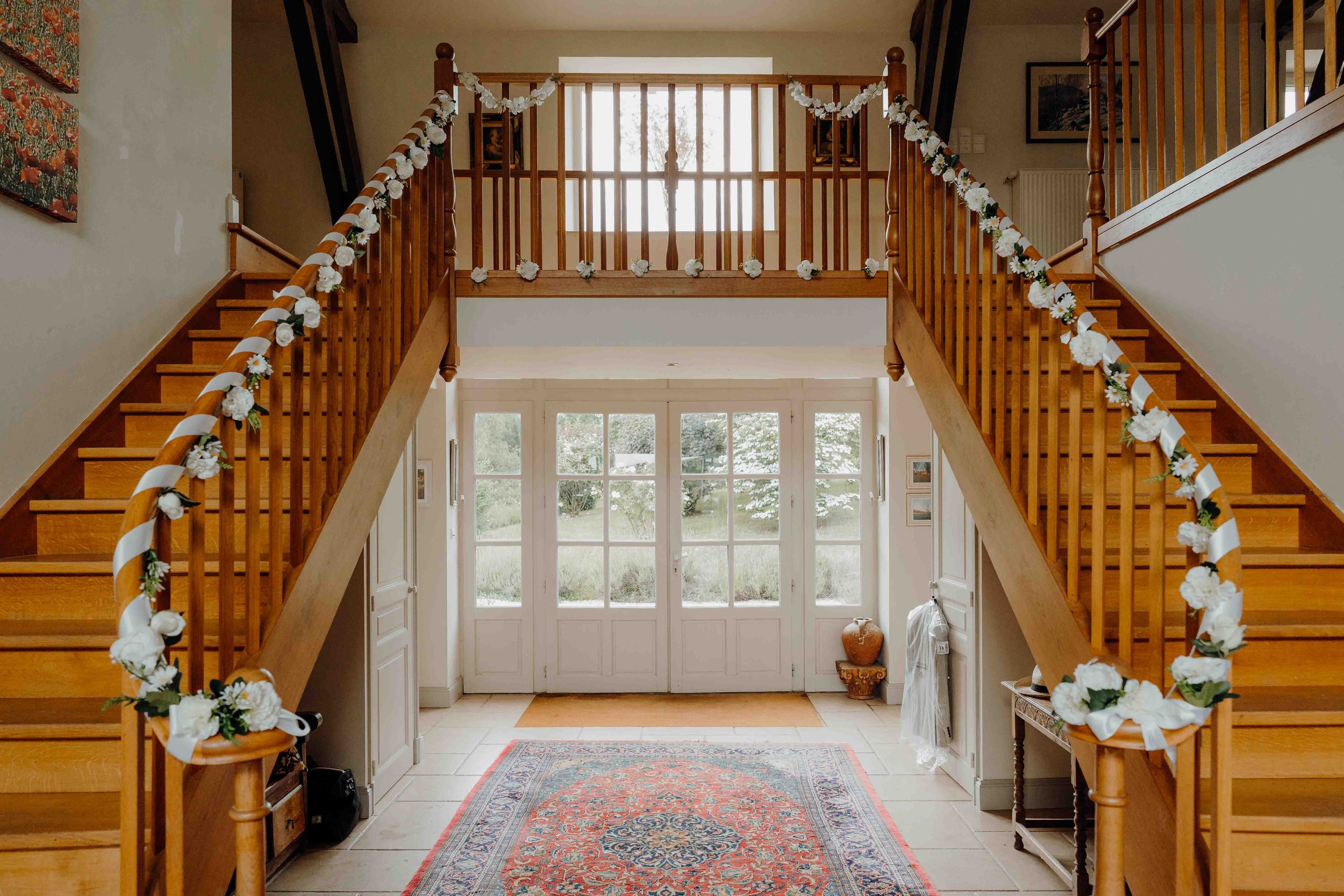 interior staircase with flowers at a wedding