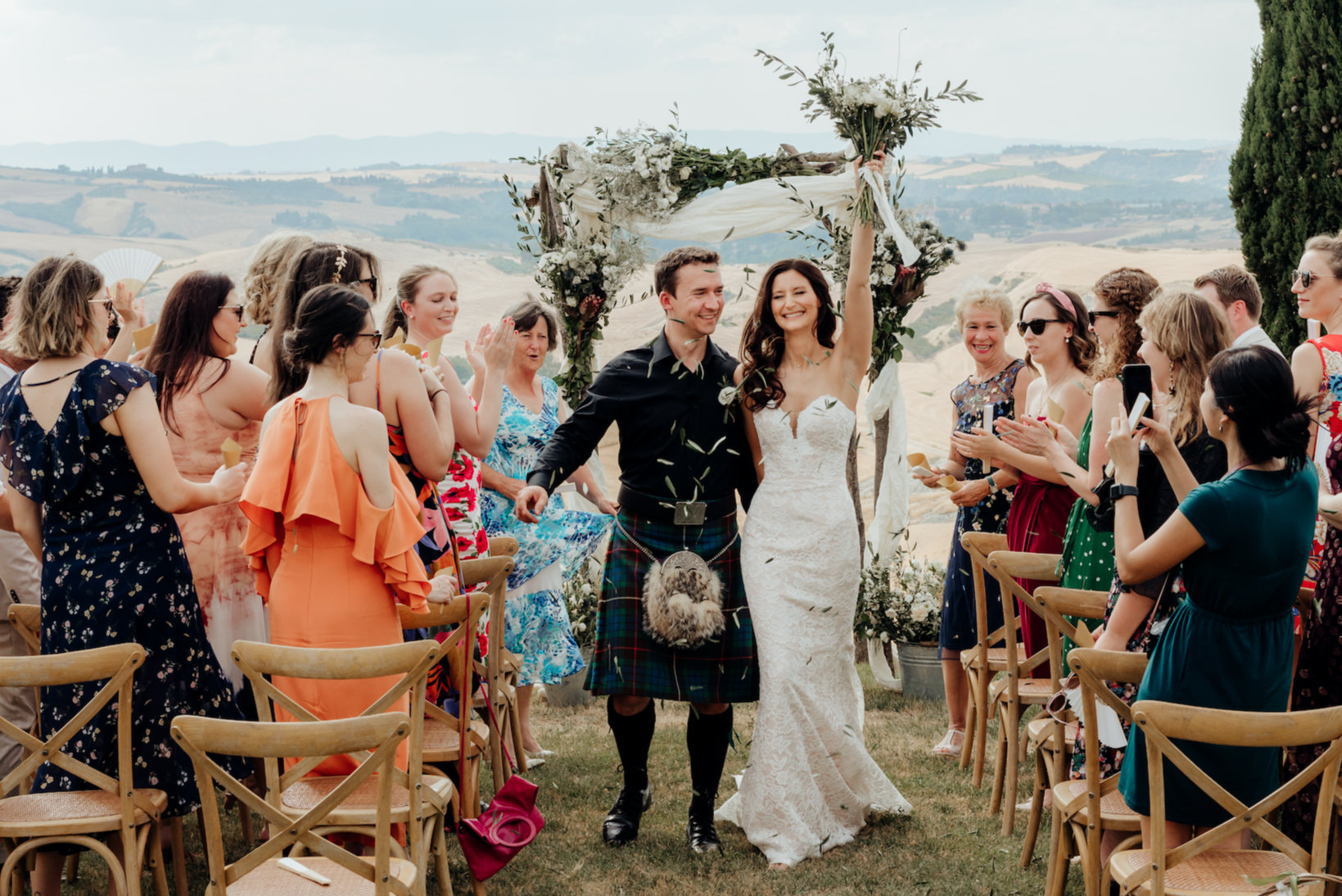 Just married walking off the aisle together.