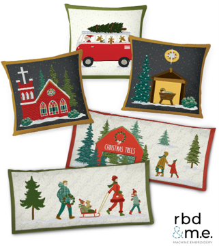 Four embroidered Christmas-themed pillows featuring a red fire truck with a Christmas tree, a red church building, a nativity scene, a snowman with children, and a Christmas tree with decorative text.