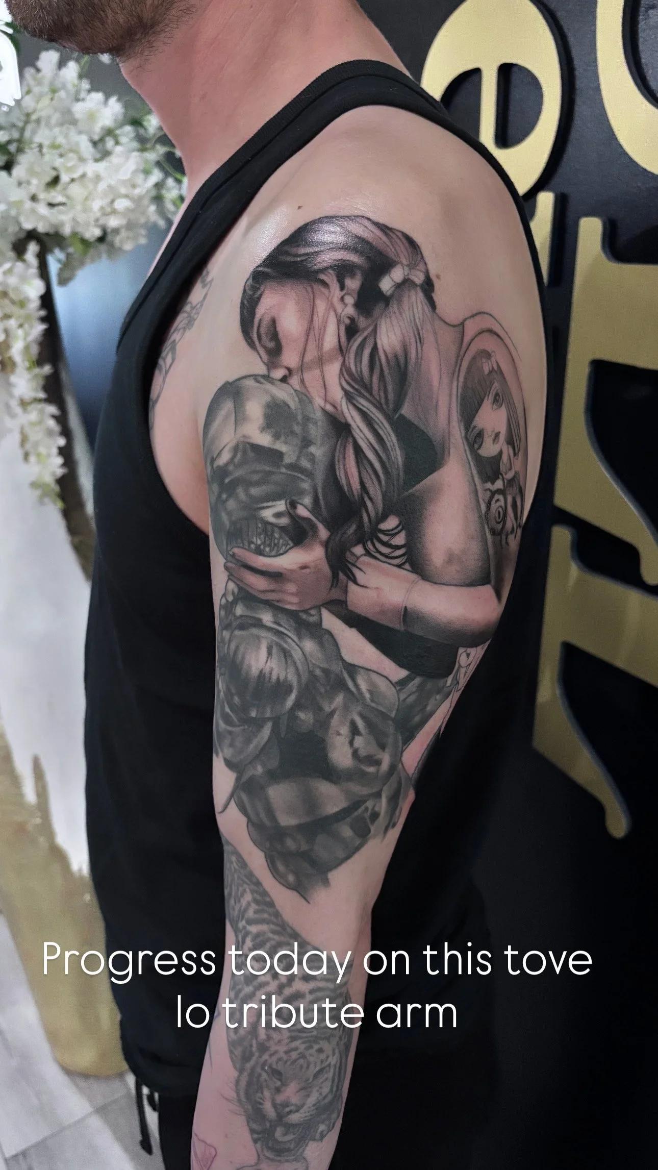 Black and gray memorial tribute tattoo on arm
