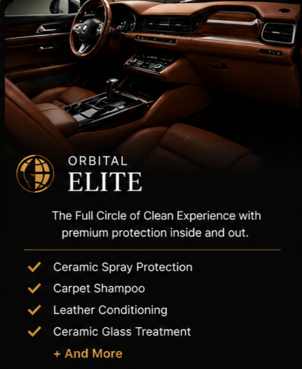Interior of a luxury car with leather seats and wood accents. Promotional text for Orbitlal Elite services, including ceramic spray protection, carpet shampoo, leather conditioning, and ceramic glass treatment.