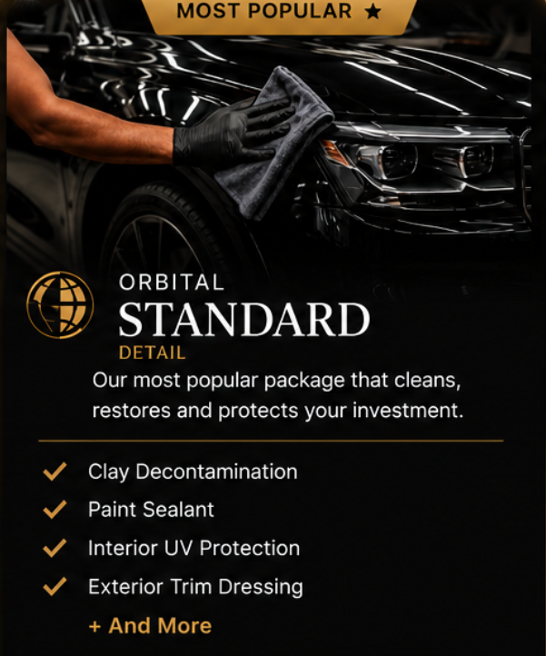 A person wearing black gloves is polishing a black car with a cloth. The background has a black and gold theme, with promotional text about a car detailing package called 'Orbital Standard Detail' that cleans, restores, and protects the vehicle.