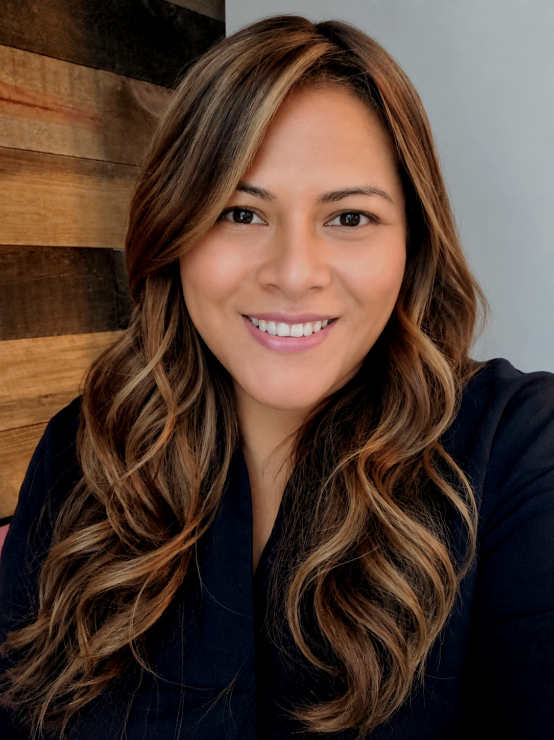 smiling woman in a professional headshot."
