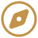 Icon of a compass or navigation symbol with a gold pin and black background.