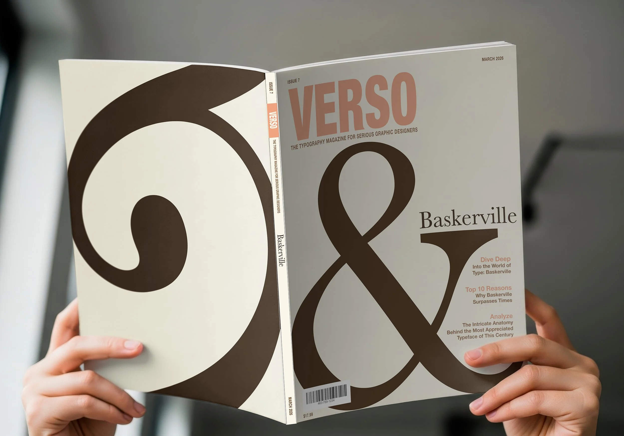 A person holding an issue of Verso magazine with a minimalist cover design featuring a large basic dark brown ampersand, with visible text including the magazine title, issue number 7, and date March 2026. The back cover has a large dark brown spiral