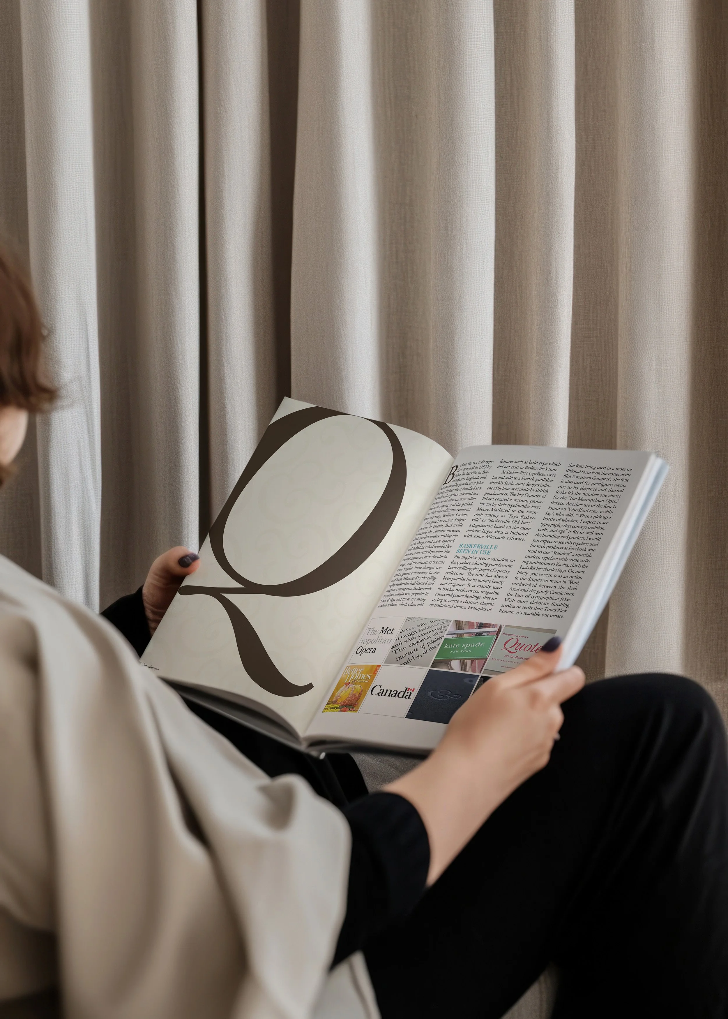 Person sitting near beige curtains reading a magazine. On the left page is a cream colored background with a large dark brown "Q" from the Baskerville typeface family. The right page has three text columns and typographic images at the bottom.