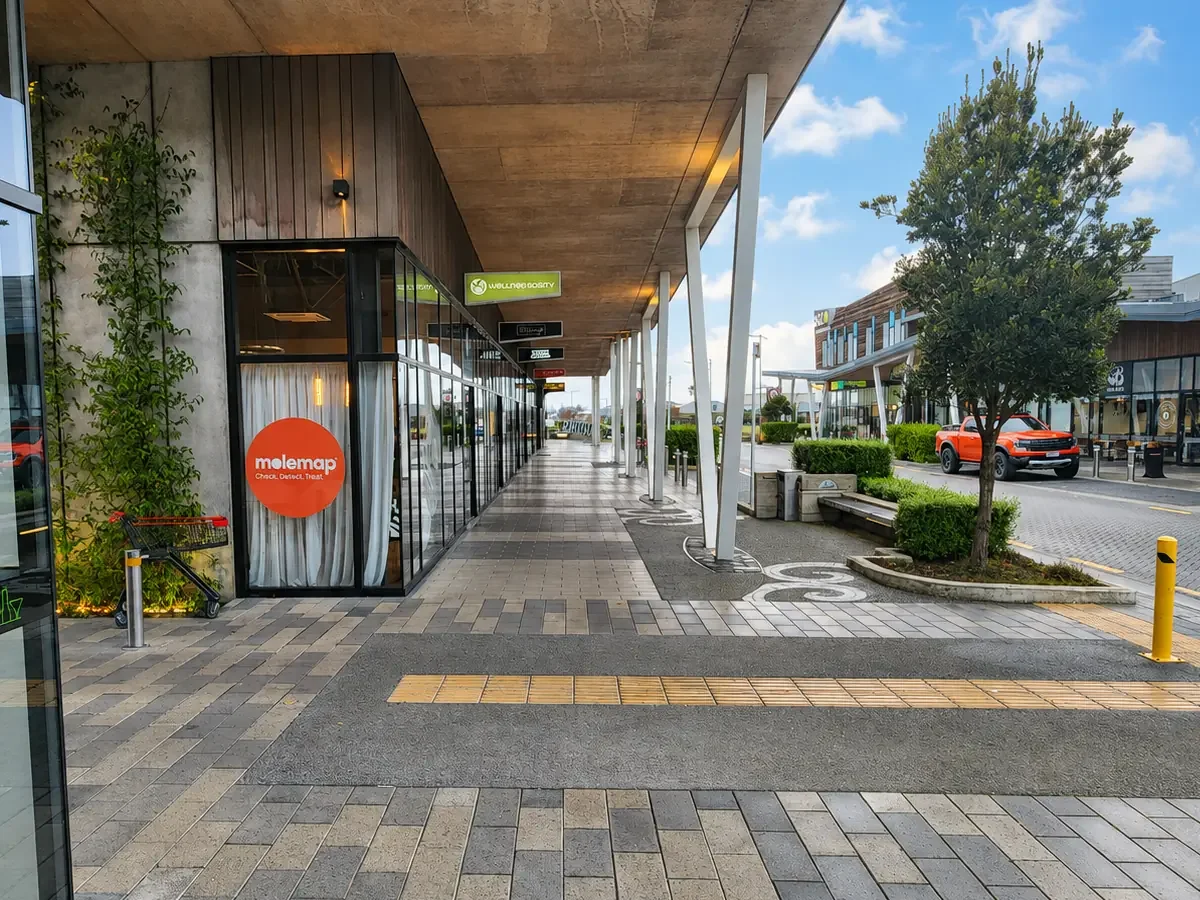 Covered shopping walkway and businesses at The Landing Wigram in Christchurch