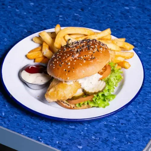 Battered fish burger served with chips at Fush Wigram
