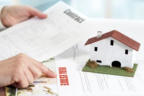 Property sale contract being reviewed during the conveyancing process