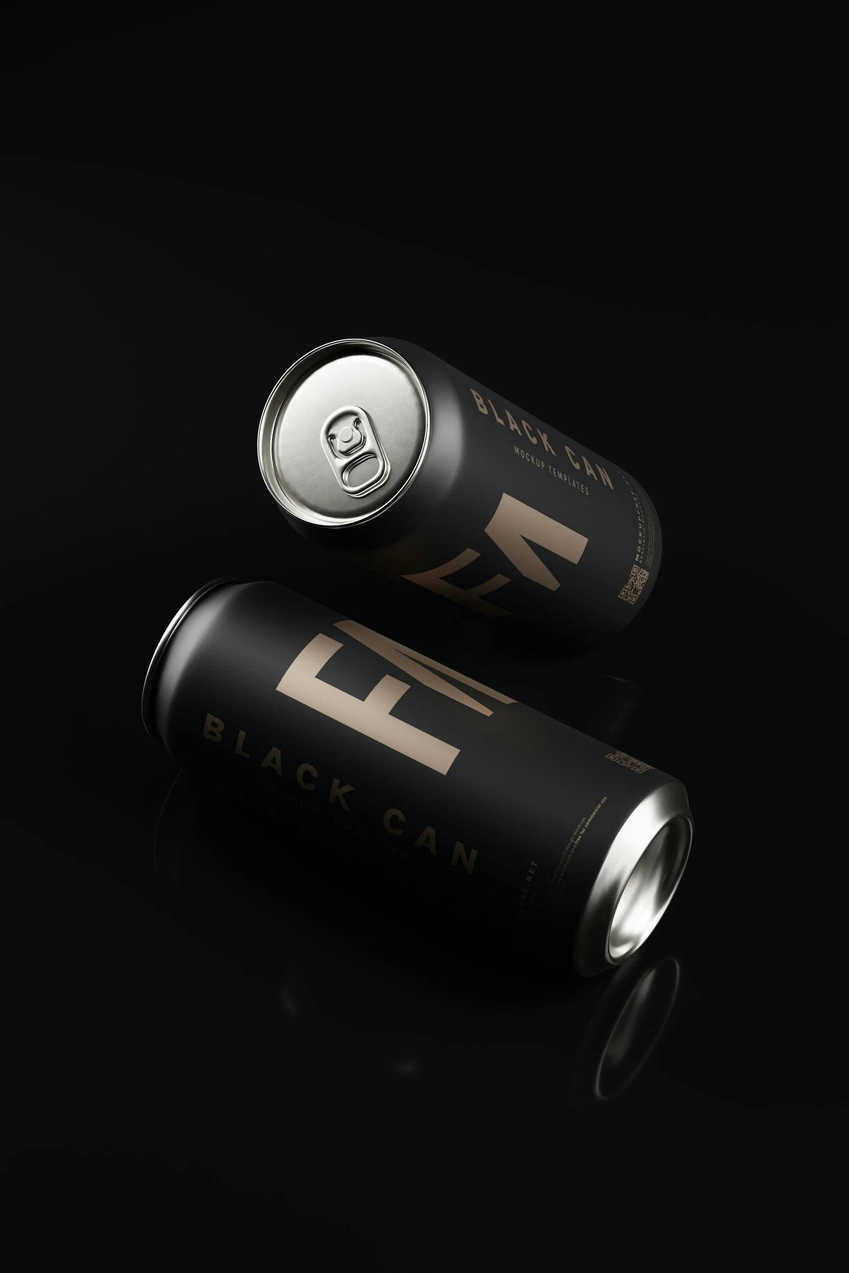 Two cans of Black Can soda on a black background, one slightly angled and reflecting light.