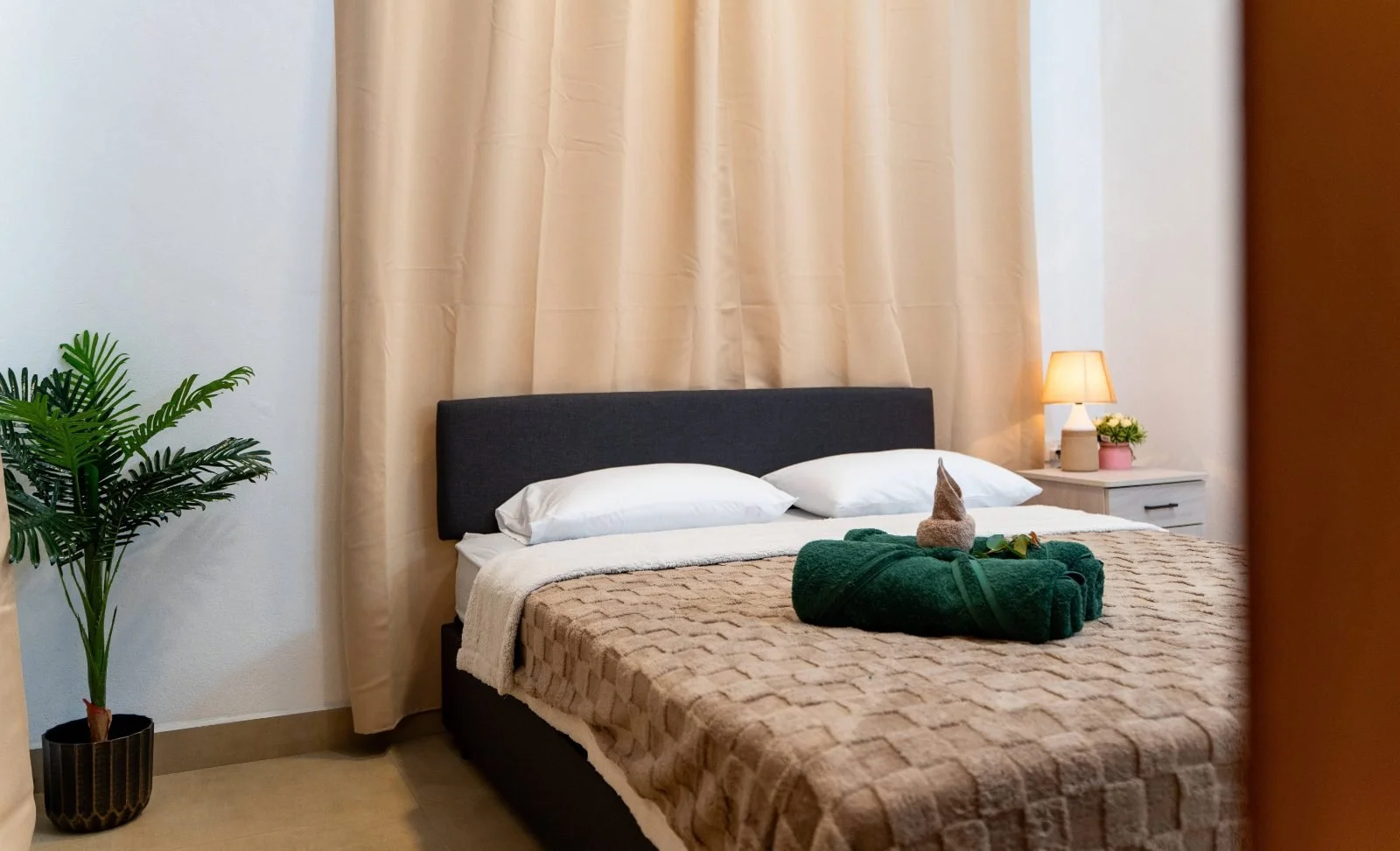 Master bedroom with en-suite at the Garden Flat, SPACES Fiji, Nausori