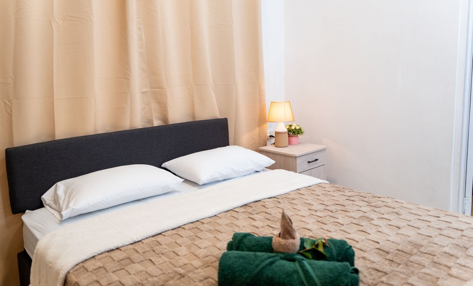 Quiet air-conditioned bedroom at the Garden Flat, Nakasi, a separate room for each colleague on a work trip