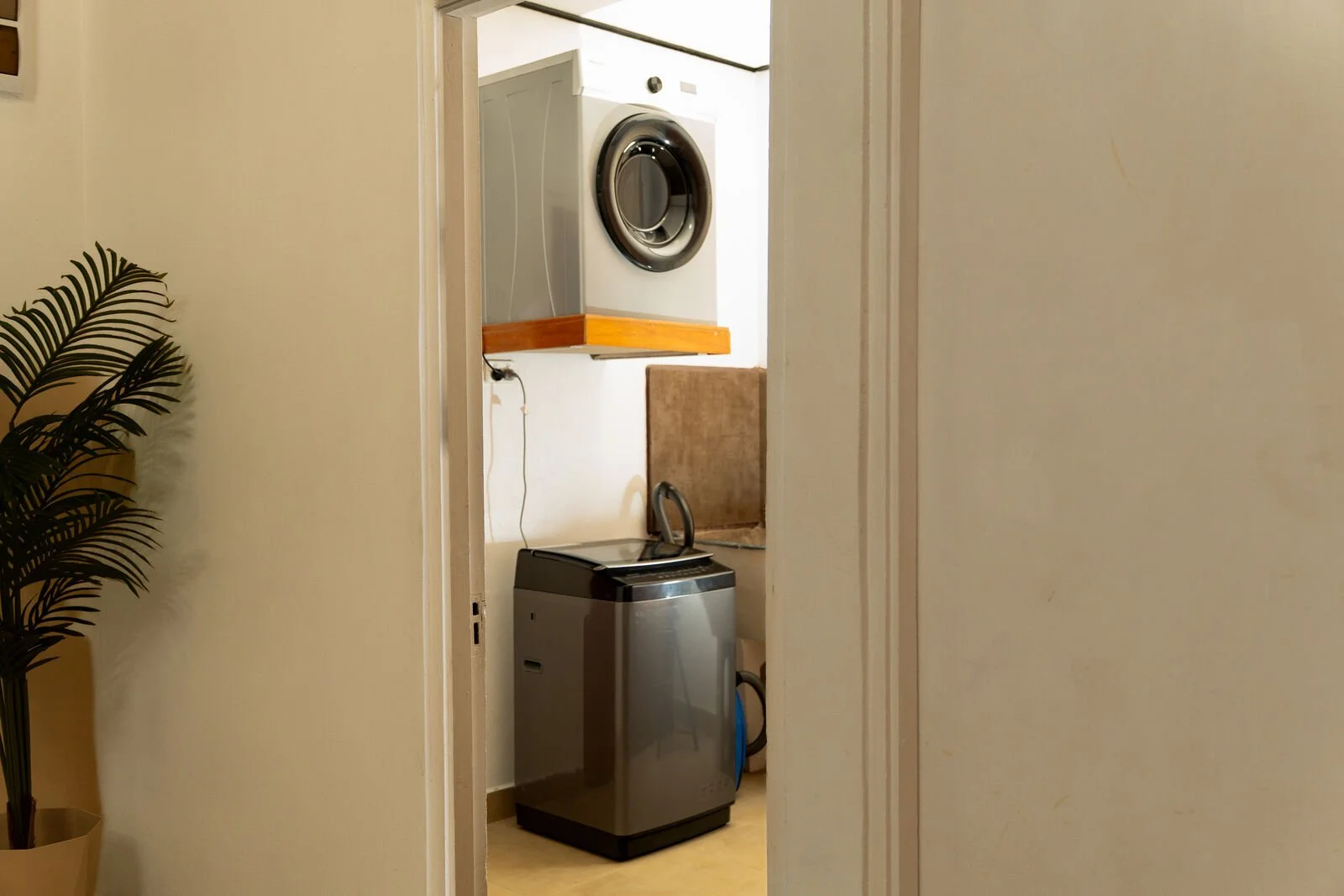 Washing machine and dryer in the Garden Flat laundry, Nakasi, Nausori, for longer family stays