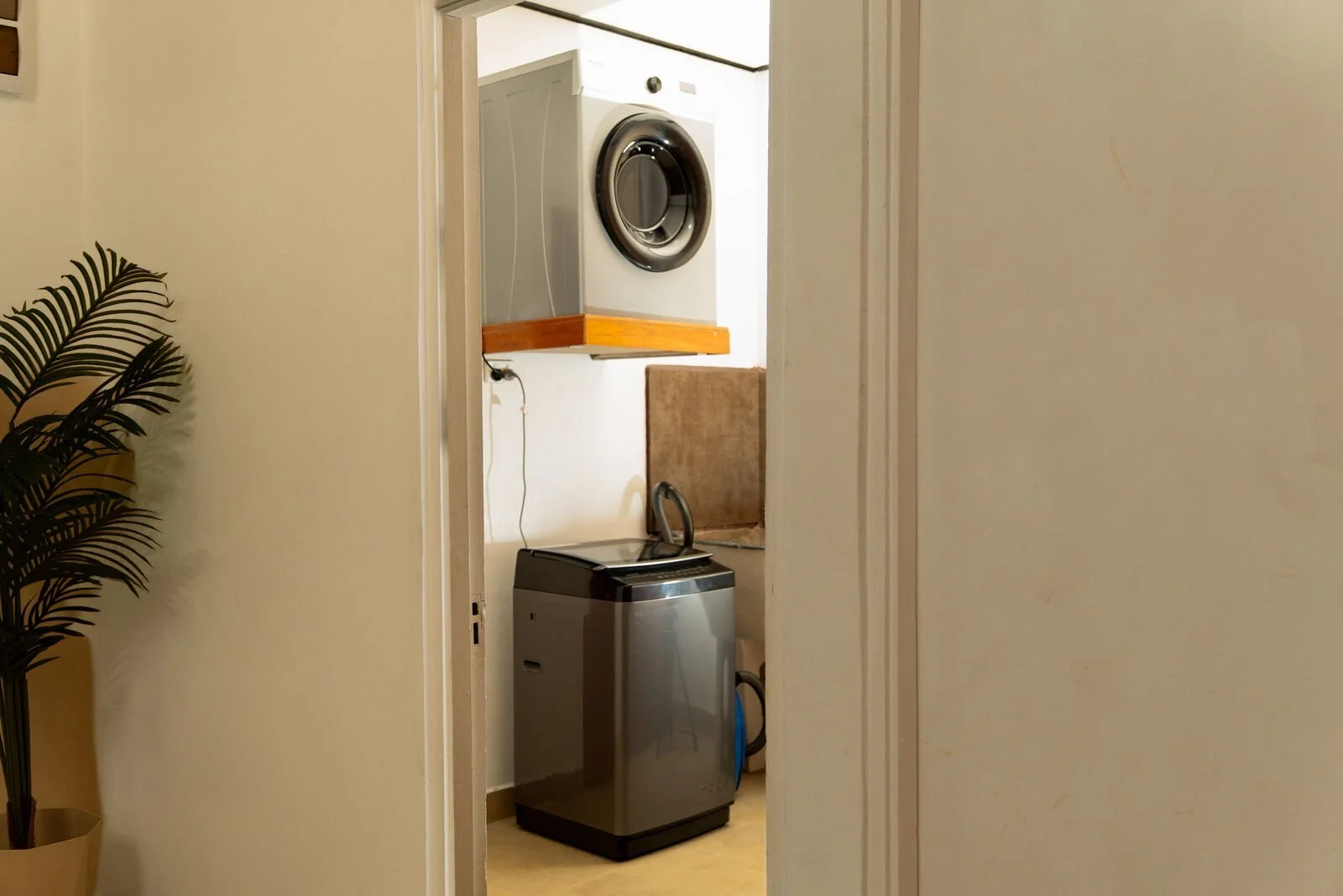 Private laundry with washing machine and dryer at the Garden Flat in Nakasi, Nausori, for long stays