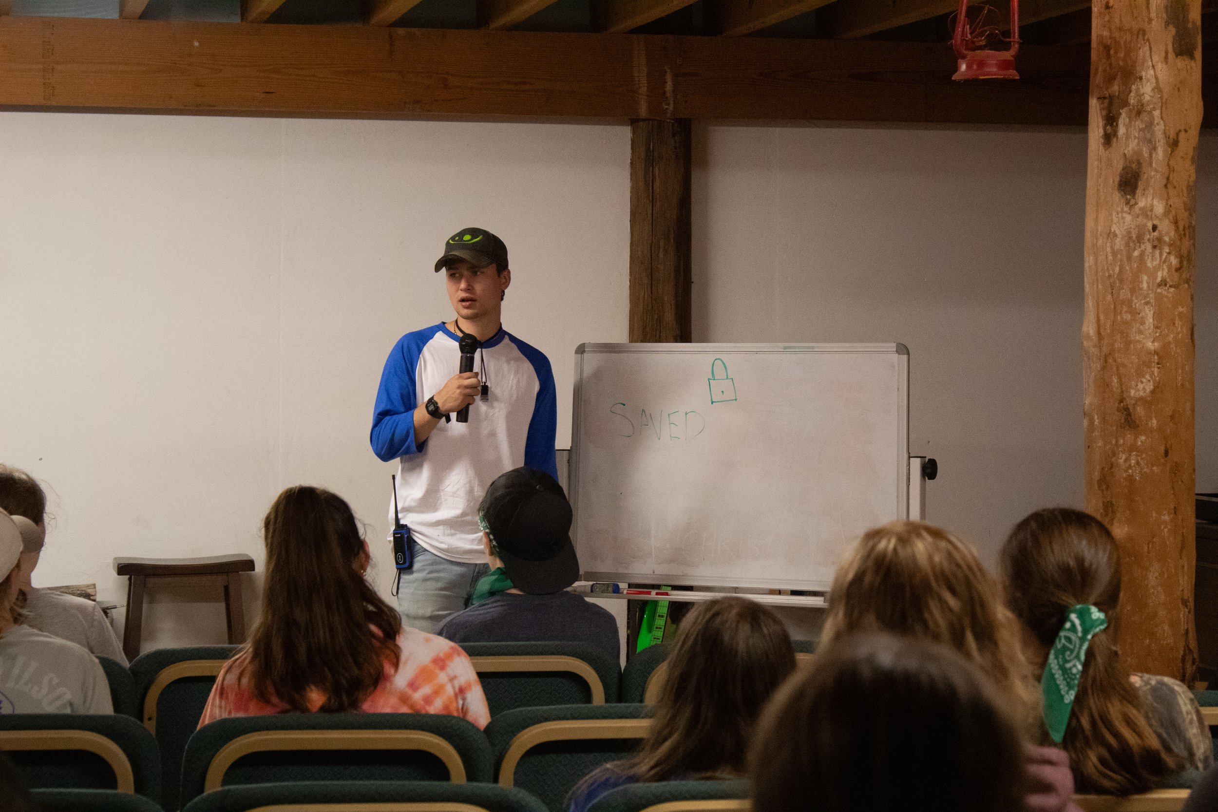 Josiah Coile preaching the gospel at camp
