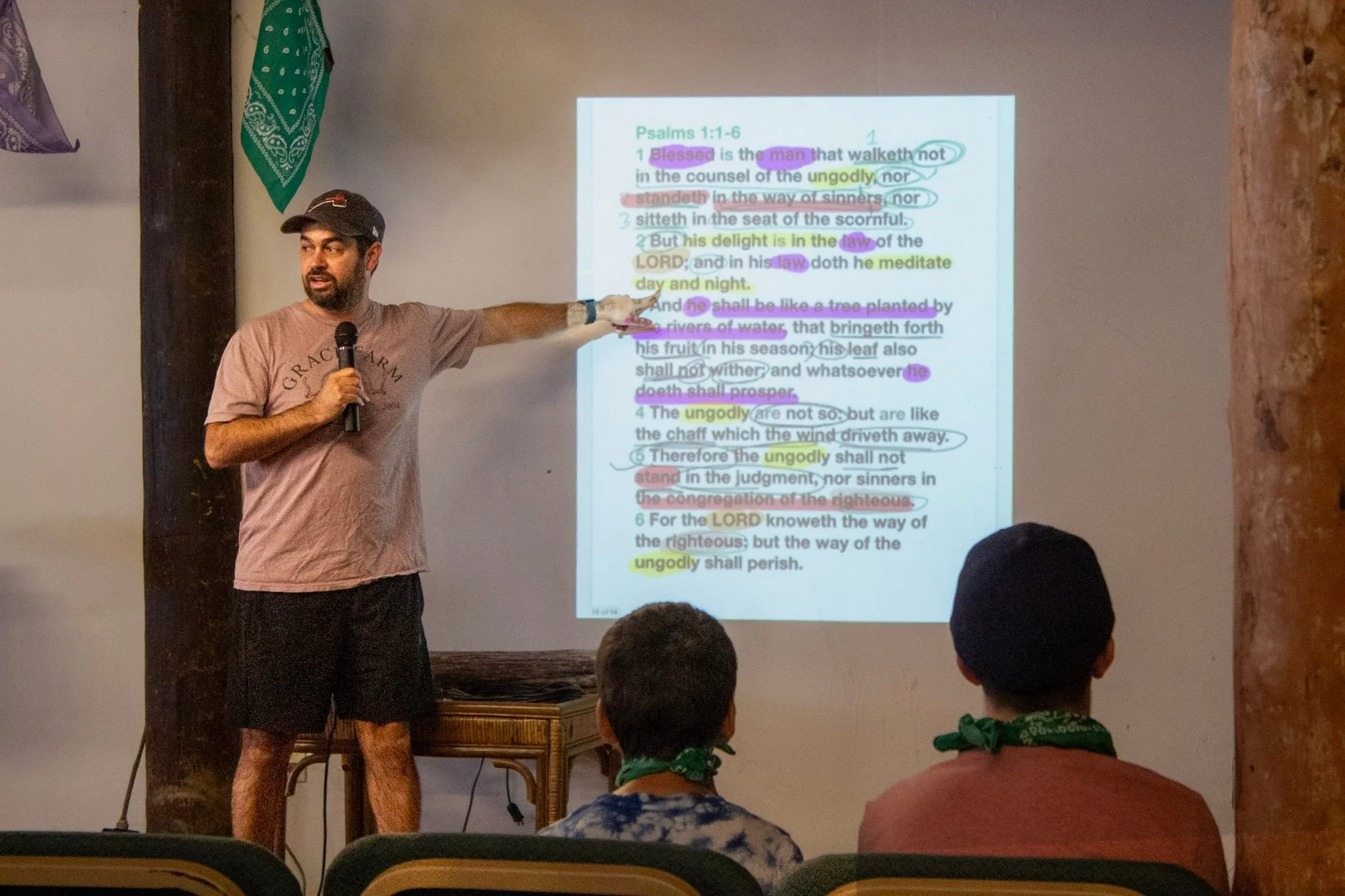 Camp Counselor preaching the bible at Junior camp
