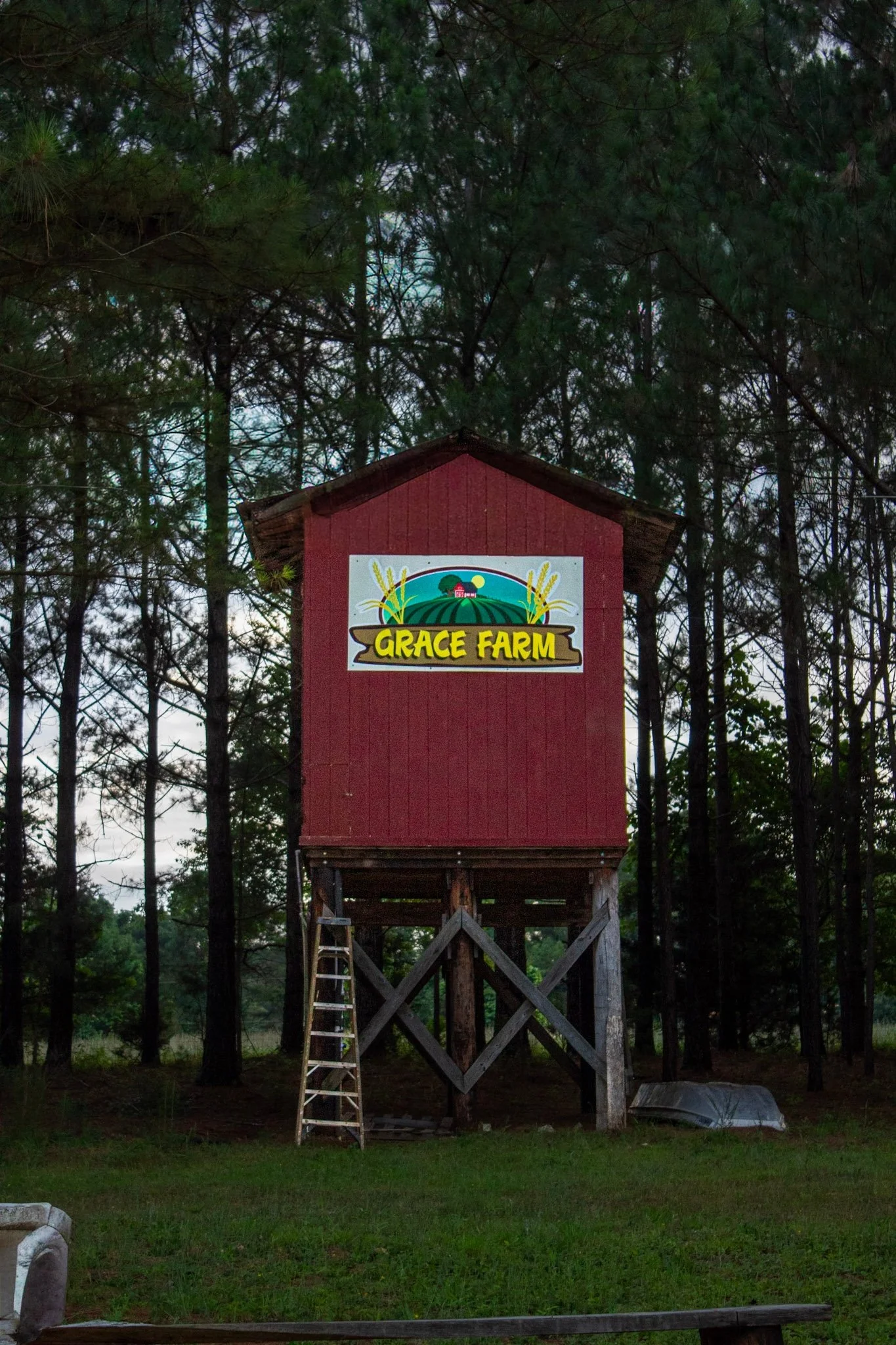 Grace Farms wood watch tower with the grace farm banner