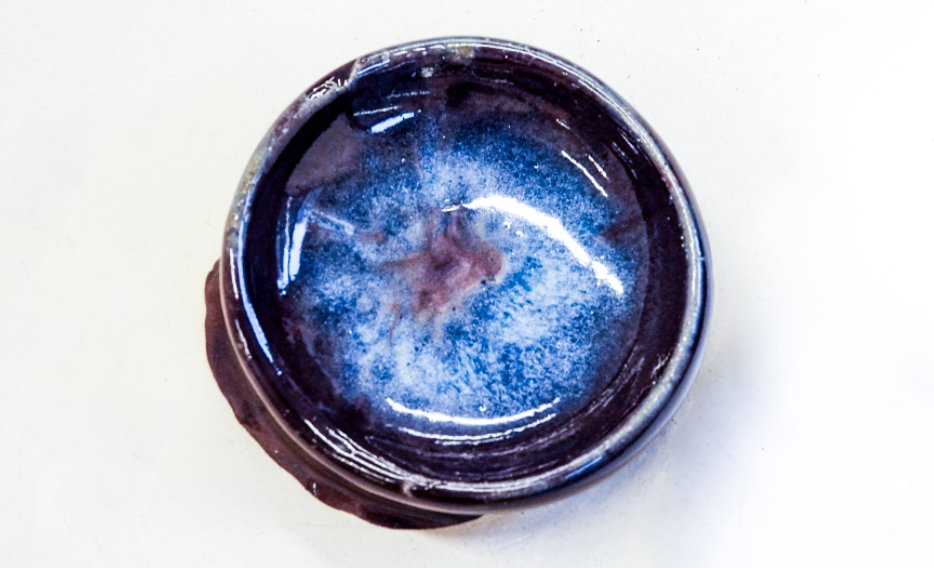 Galaxy produced by experimenting with layering glazes.