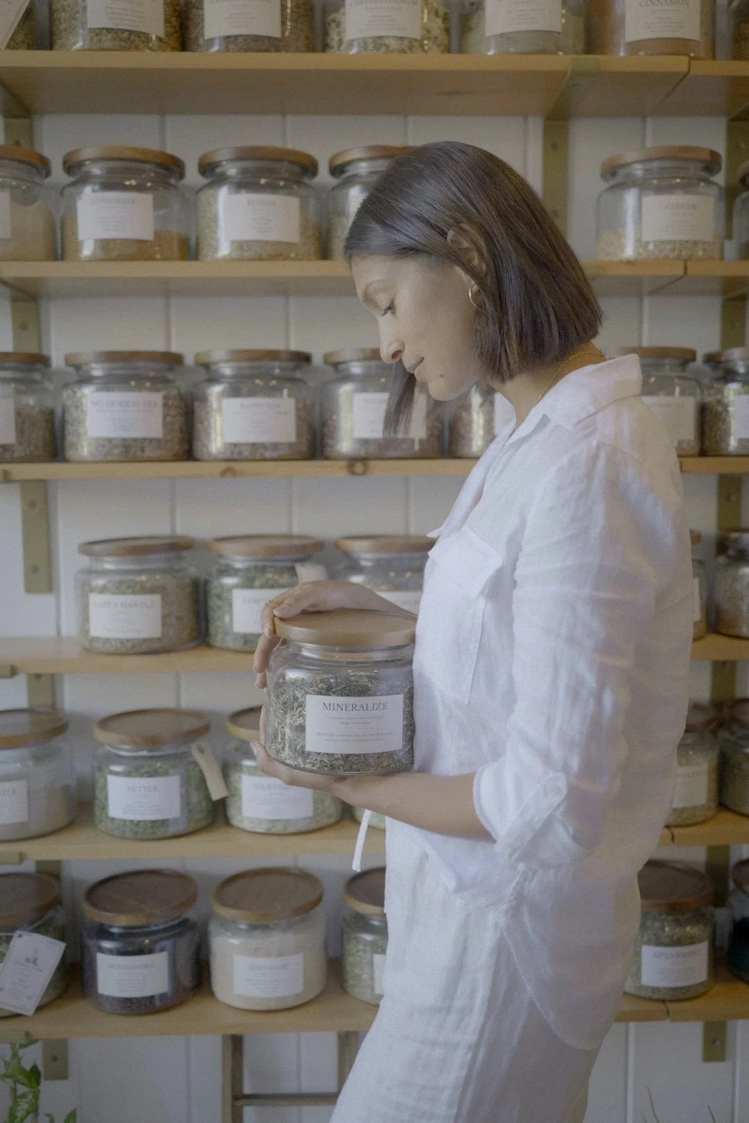 Dr. Brisa Mahoney in an herbal apothecary