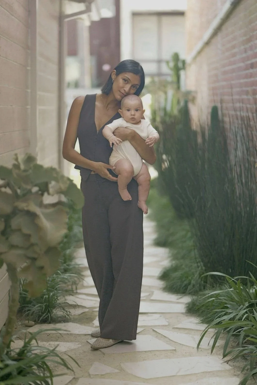 Dr. Brisa Mahoney, ND, holding a baby